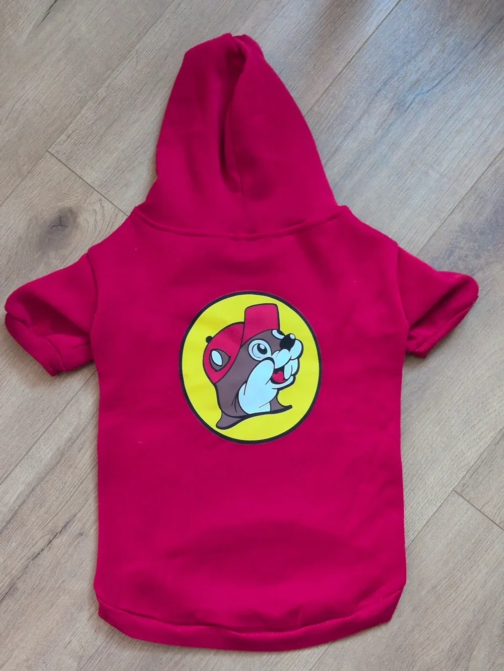 Vibrant Red Dog Hoodie with Playful Buc-ee's Mascot Graphic Size L